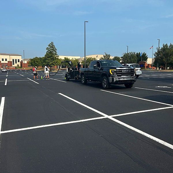 Fresh line striping across a commercial parking lot